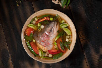 The city of Palembang on the island of Sumatra is famous for its seafood dishes, and this pindang salmon (salmon in spicy and sour soup) is one such dish.
