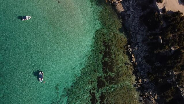 Aerial drone view of the rocky coast and the Mediterranean Sea near the scenic Aphrodite Trail in the Akamas Peninsula National Park, Cyprus. Famous tourist travel destination near Polis city, Cyprus