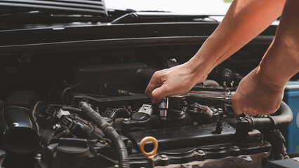 car service, repair, maintenance. A technician checks collect detailed information during work. service maintenance of industrial to engine repair
