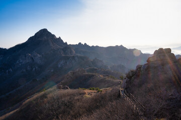 Scenic view of mountains against sky during sunrise