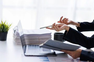 Team of diverse coworkers working together in office brainstorming, discussing analyzing charts graphs banner and planning business strategy concept.