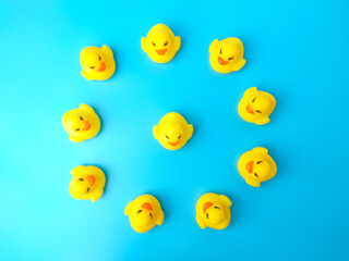 Group of toy ducks with leadder. Leadder and teamwork concept