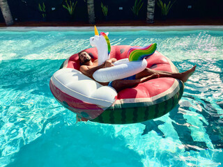 person on a pool bed