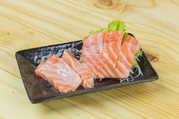 Salmon sashimi with withe plate isolated on white background