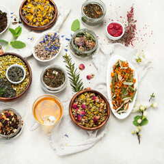 Herbal tea assortment on dark background.