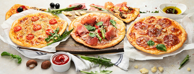Fototapeta na wymiar Set of delicious homemade pizzas.