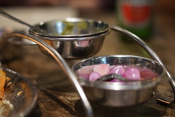 Pickled onions served on an Indian restaurant's table