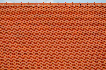 Roof tile on top sky background