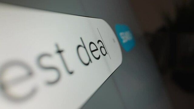 Motorized moving shot of searching for best deal on Internet, shot with macro probe lens