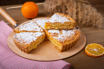 sliced pie sprinkled with powdered sugar