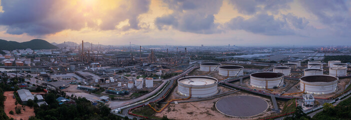 Panorama image. Aerial view drone of oil storage tank with oil refinery factory industrial. Oil...