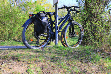 Fototapeta premium Regensburg, Germany: two bicycles parked on a rural road