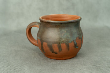 Ceramics, a ceramic product made with hands, made on a potter's wheel, a jug, a mug, clay.