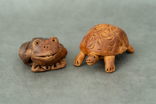 Ceramics, ceramic product made by hands, frog, turtle, owl, horse, whistle.
