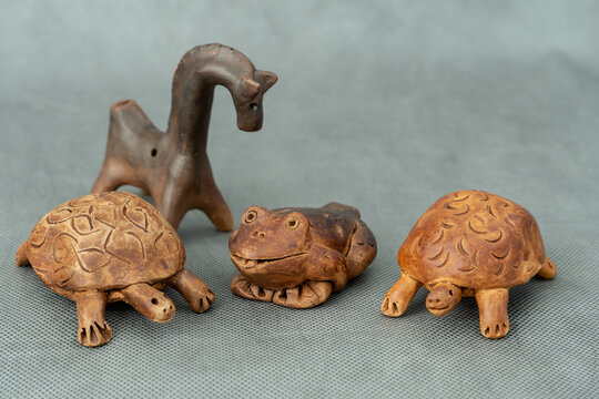 Ceramics, ceramic product made by hands, frog, turtle, owl, horse, whistle.
