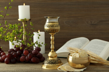 Concept or composition of Eucharist on wooden table