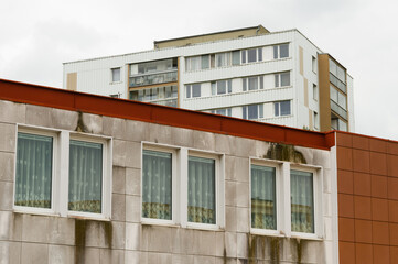 Fototapeta na wymiar Communist style uniform concrete apartment houses in Prague