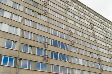 Communist style uniform concrete apartment house windows