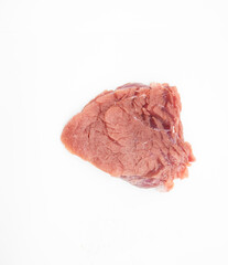 Raw beef meat over on white background, top view, beef pieces