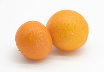 selective focus, Tangerine or kamala on white background