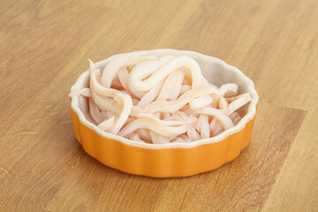 Marinated squid strips in the bowl