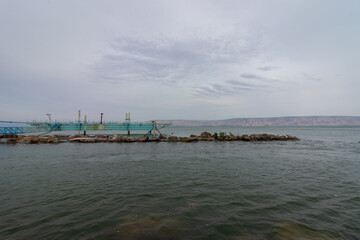 The Sea of Galilee is full of water to the end, after a particularly rainy winter - cloudy skies of winter - Tiberias