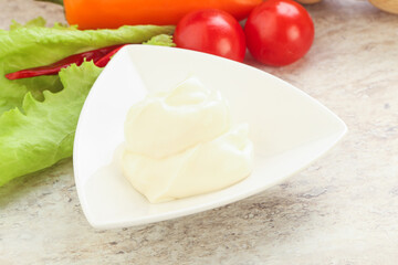 Organic mayonnaise sauce in the bowl