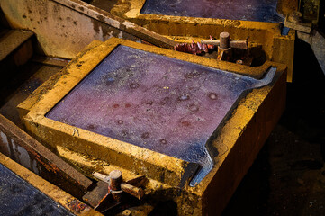 Copper ingot in anode casting form in metal melting workshop