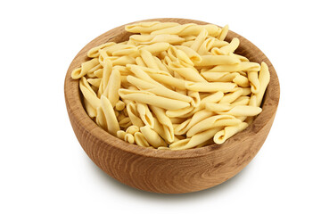 Typical Calabrian pasta called Maccheroncini or Maccheroni in wooden bowl isolated on white background with full depth of field.