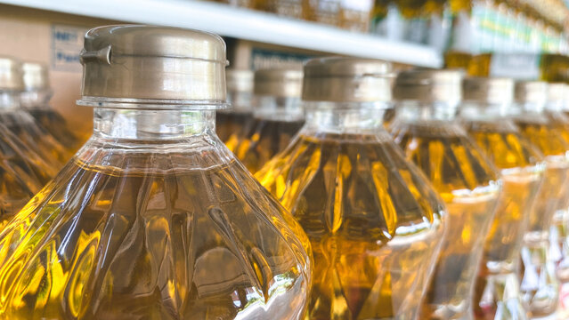 vegetable oil in bottle pattern factory warehouse store food background