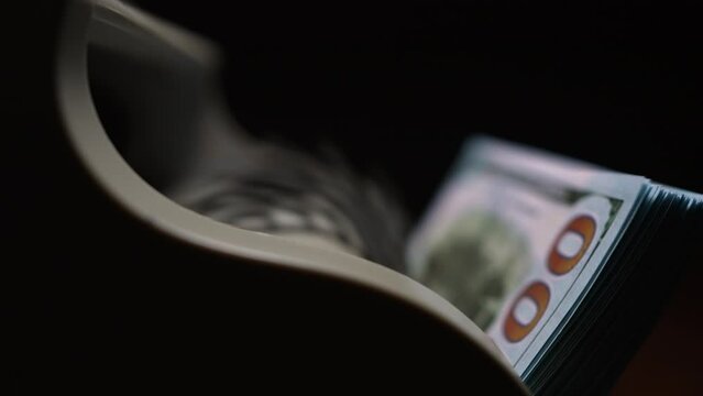 Currency Counting Machine Counting Dollar Banknotes. Banking and Commercial Activity. Money Cash. Close up Bill Counting Machine Counting Cash Money 100 Usd Dollars