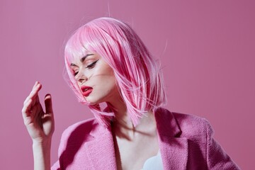 Beauty Fashion woman in a pink blazer pink wig cropped view studio model unaltered