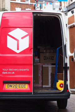 the back of a dpd parcel truck van parked in a British street 