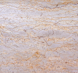 Textured wall lined with shell rock tiles.