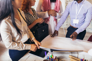 Multicultural business people meeting and talking about business investment. Arab business man in a meeting.