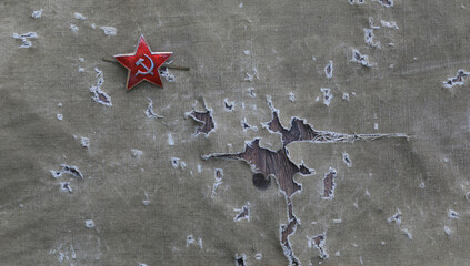 military red soviet badge star on canvas