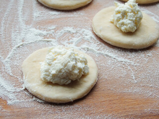 cooking. Dumplings with cheese. Ready for cooking dumplings with cottage cheese.