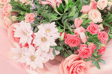 bouquet of roses and other flowers close-up