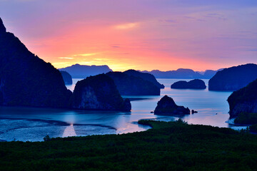 Sunrise Samet Nangshe Viewpoint, limestone karst formations and small islands at Phang Nga Bay with the beautiful clouds background, Phang-Nga province Thailand