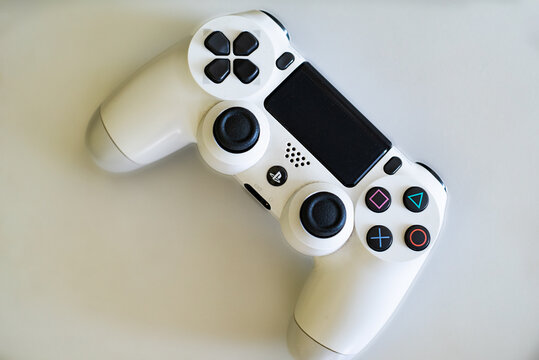 Ukraine. Uzhhorod June 3. 2022. White Game Controller And Console On The Background. Ps4. Console Wallpapers