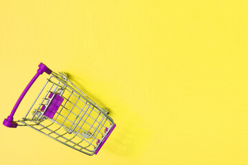 A Shopping Cart Isolated On pink background
