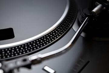 Retro dj turntable for vinyl records. Professional analog disc jockey audio equipment. Curated...