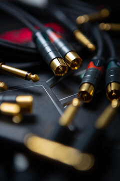 Professional audio cables for sound recording studio. Connector musical equipment with hi fi cable connectors. Curated collection of royalty free music images and photos for poster design template