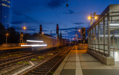 Fototapeta na wymiar Cologne June 2021: Deuz train station at night in long-term exposure