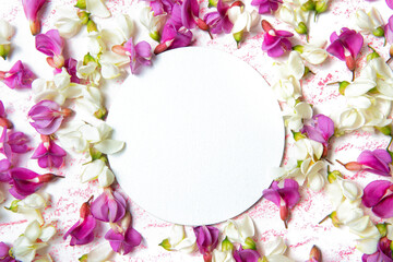 Obraz na płótnie Canvas Floral frame made from acacia petals
