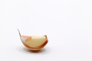a clove of garlic on a white background