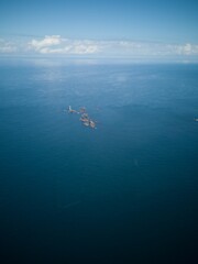 Obraz premium lighthouse off the coast of cornwall aerial 