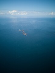 lighthouse off the coast of cornwall aerial 