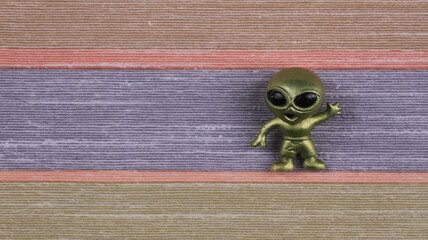green alien on a green planet