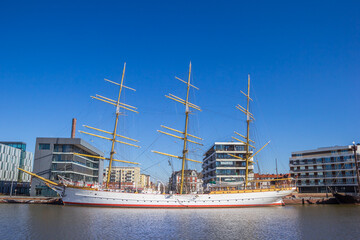 Tall white ship in the Neuer Hafen harbor of Bremerhaven, Germany
